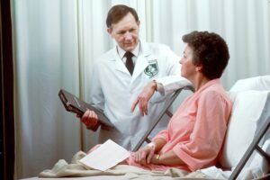 doctor talking with woman